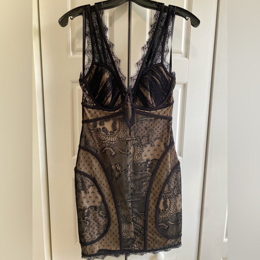 Bebe - Lacey, sleeveless, short black dress